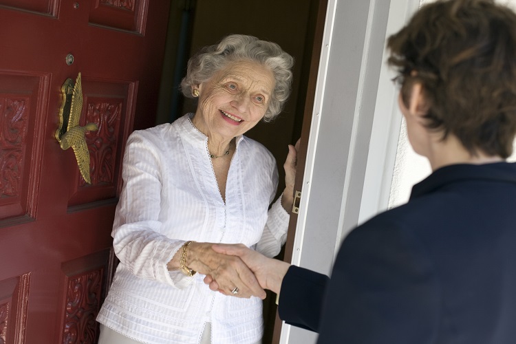 Stock_womanatdoor