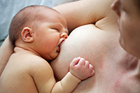 mother breastfeeding baby