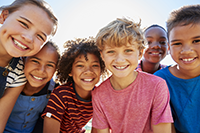six young friends smiling