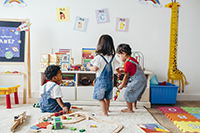 Three kids in preschool