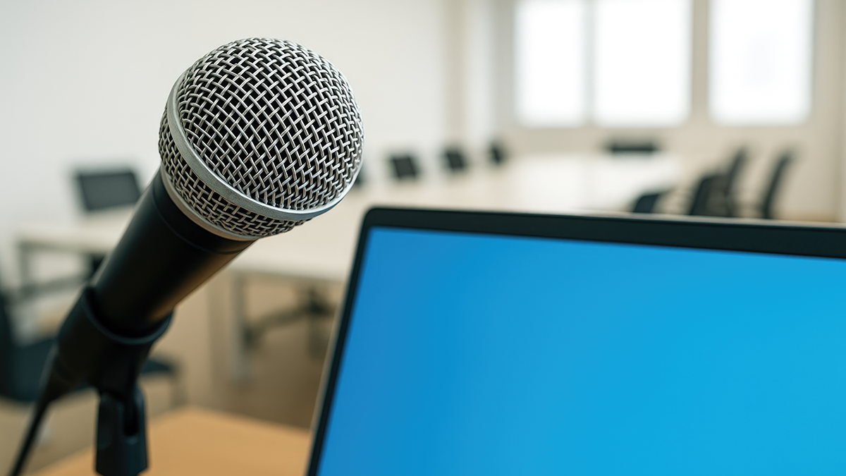 image of a microphone and laptop