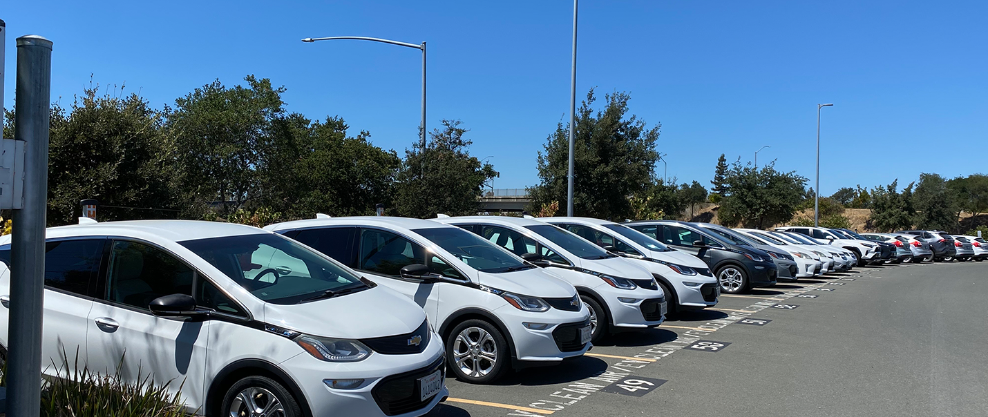 image of a row of cars in a parking lot