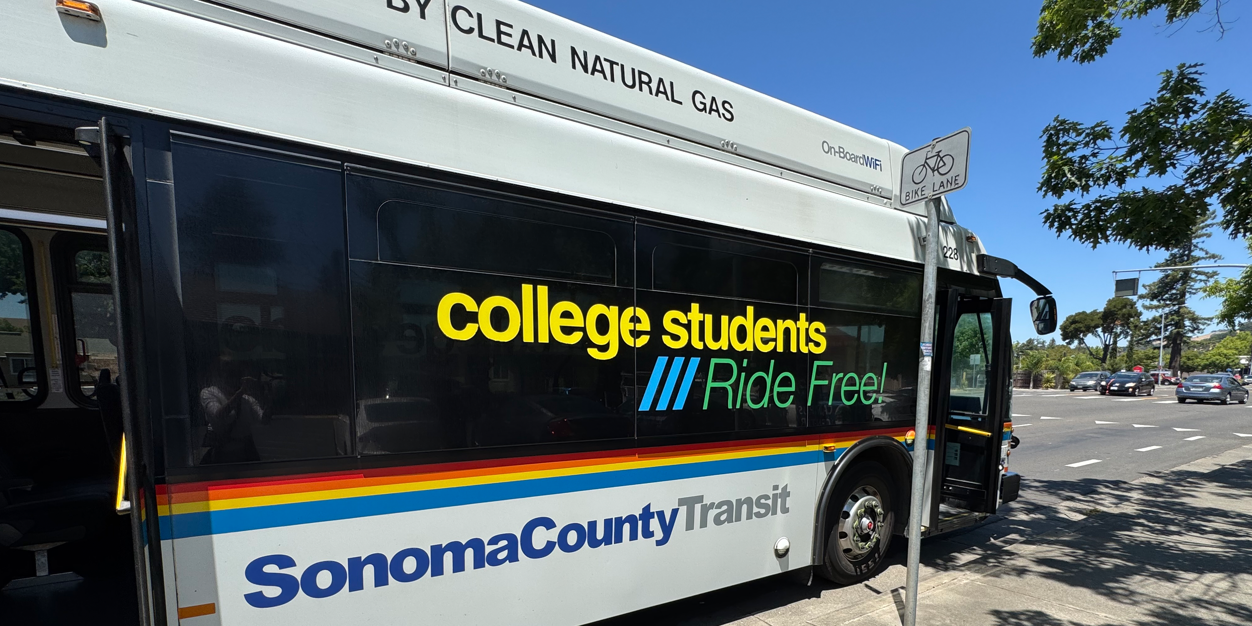 image of a public bus at a stop